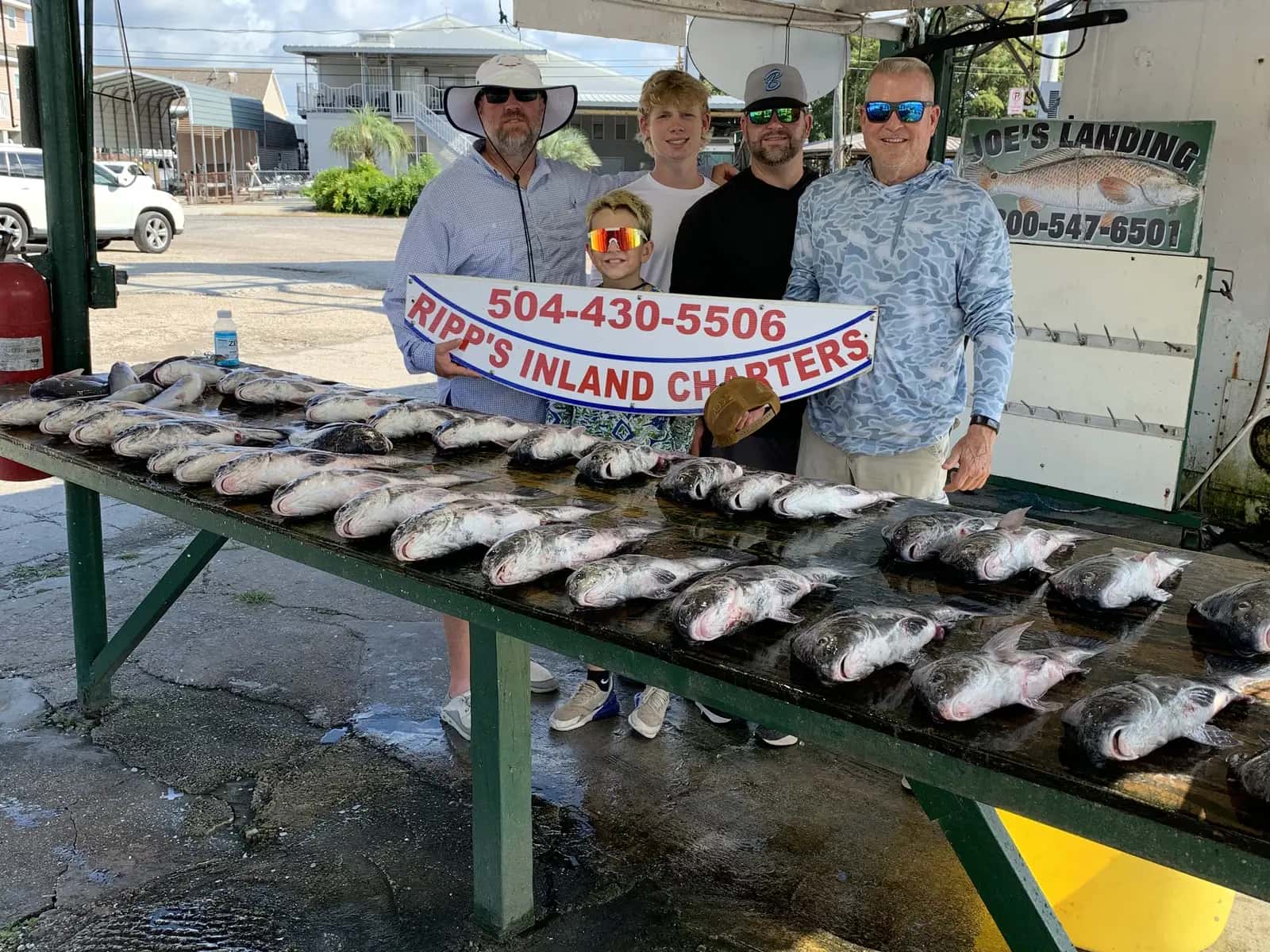 Charter group posing with their catch at Joe's Landing
